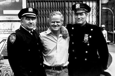 Petrie on the set of Fort Apache: The Bronx, with Ed Asner (left) and Paul Newman (right).